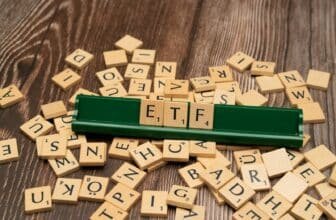 scrabble tiles spelling out letters on a wooden table
